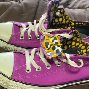 Purple Converse sneakers 
Double tongue leopard print